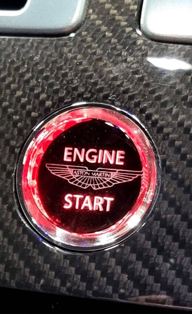 Modified Aston Martin start Button red