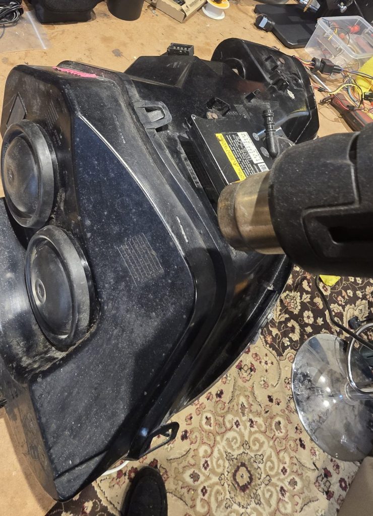 warming DB9 headlight for removal