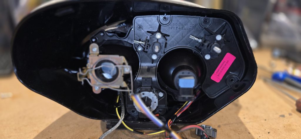 DB9 Rear headlight plate